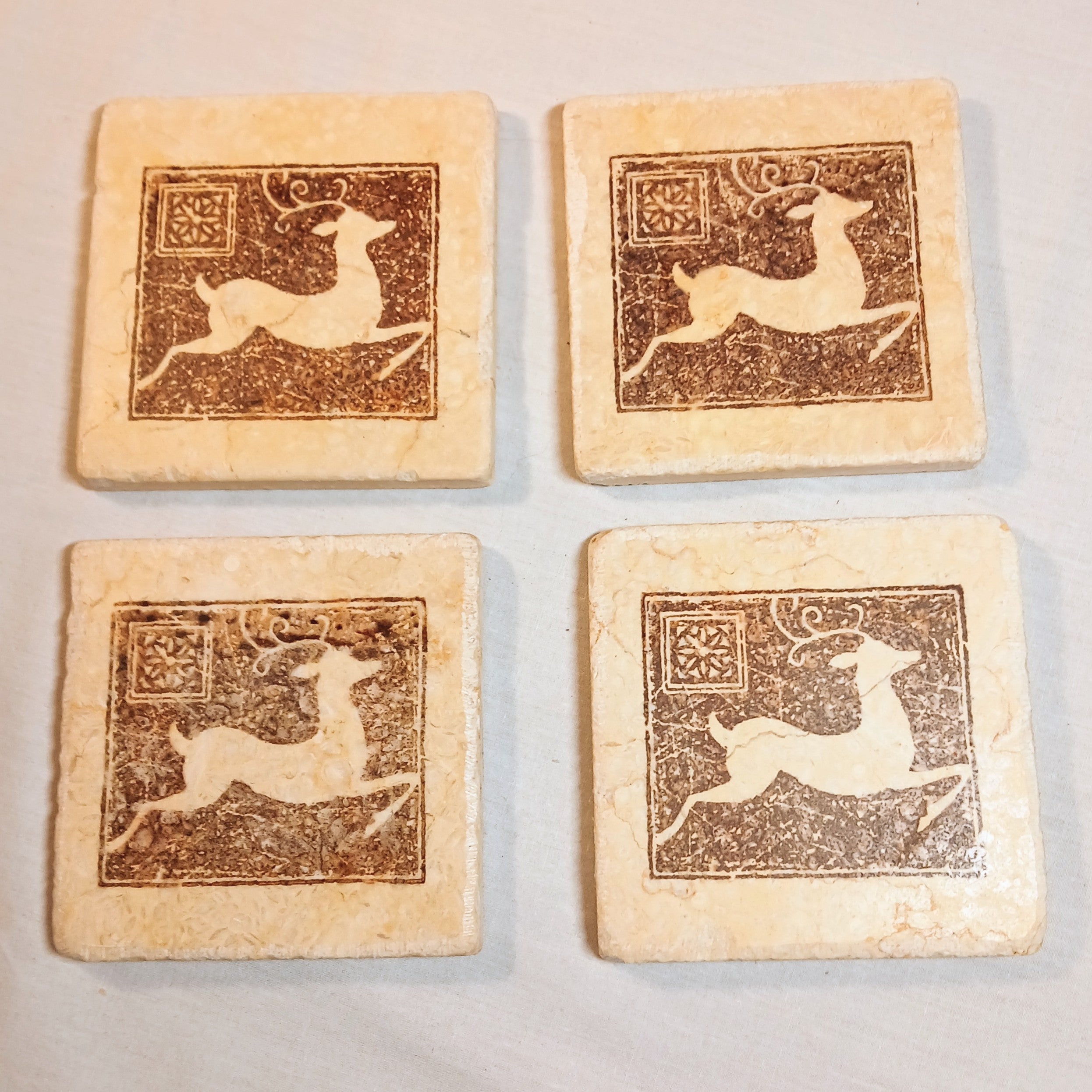 Stone Coasters - leaping Deer Motif - Set of Four
