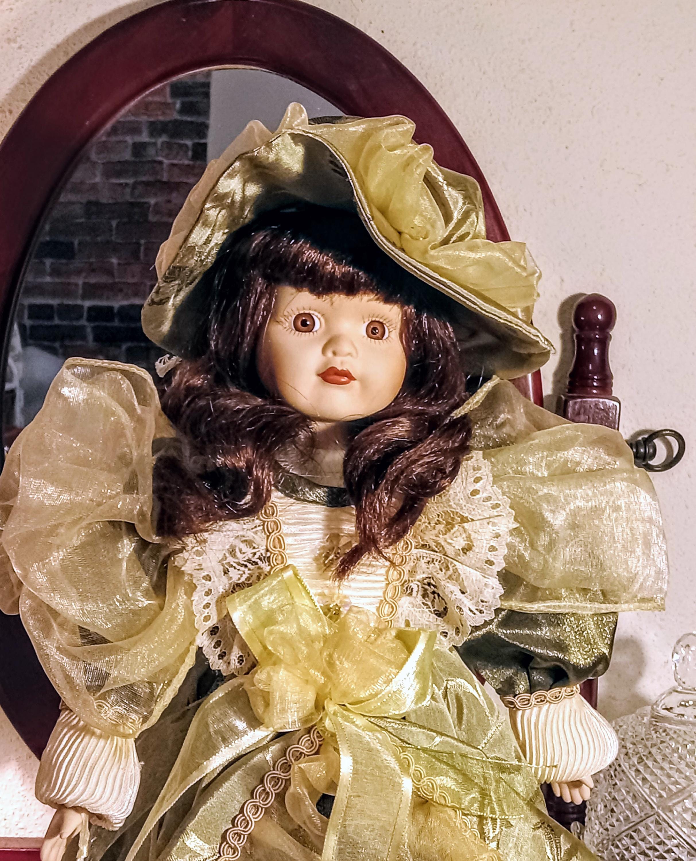 Vintage Porcelain Doll by  Galeria Inc - Includes 2 Dresses