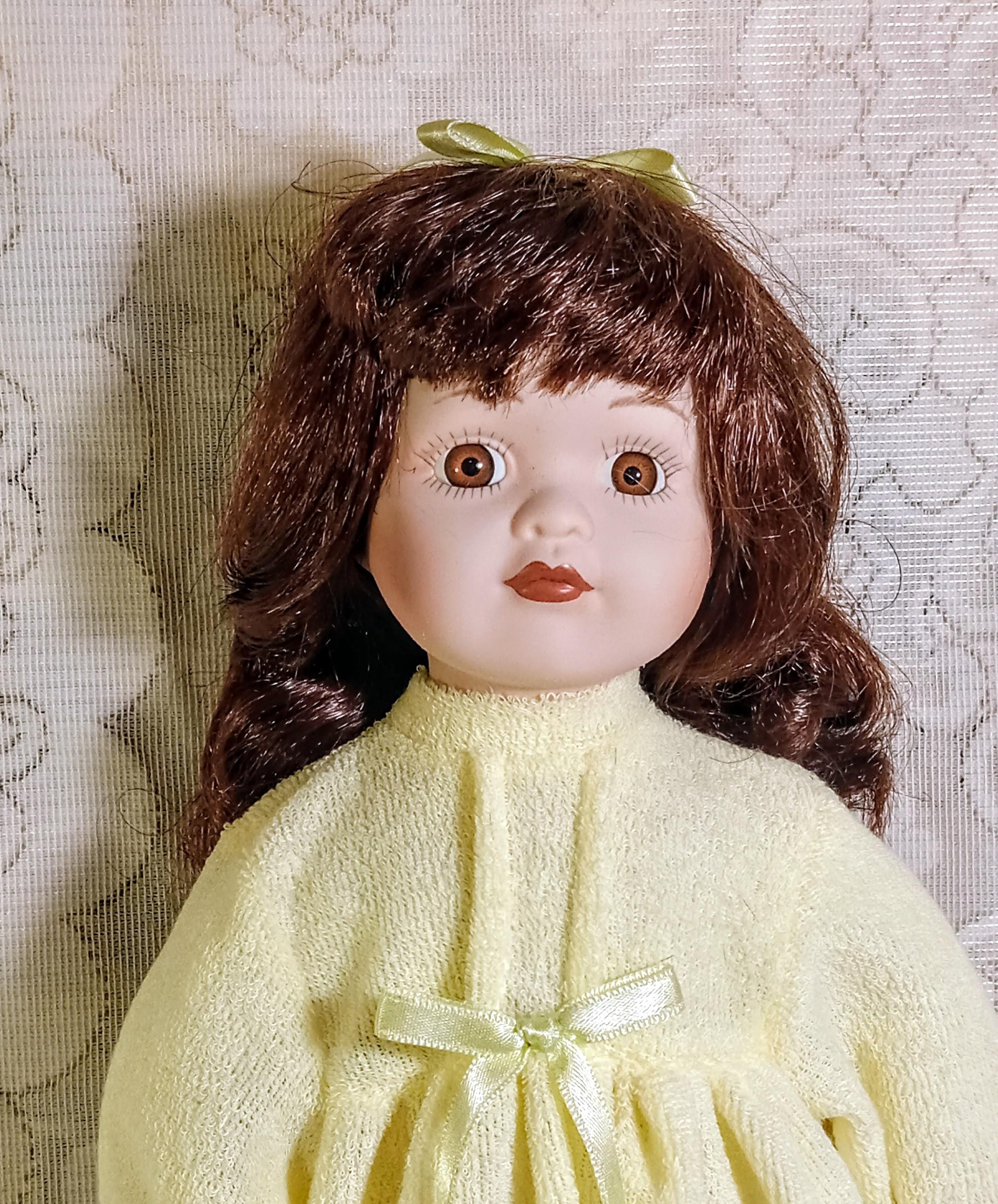 Vintage Porcelain Doll by  Galeria Inc - Includes 2 Dresses